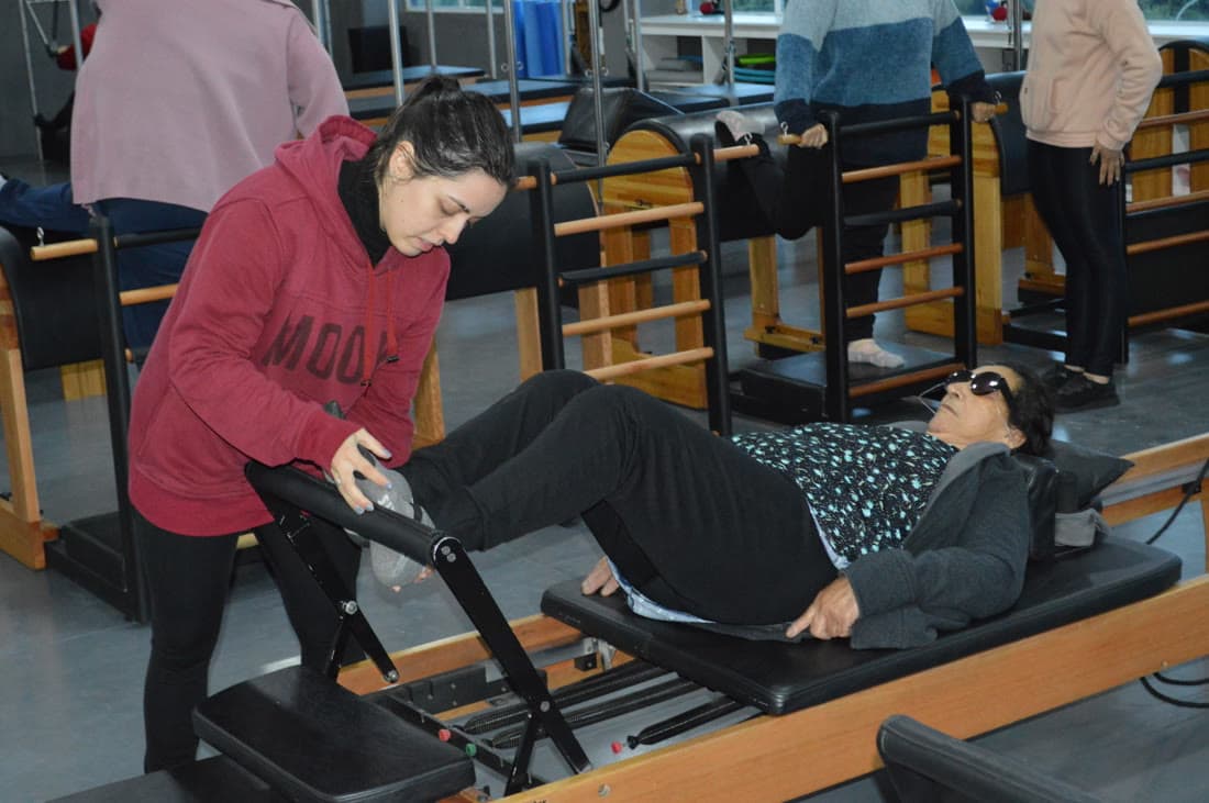 Alongamento assistido no reformer